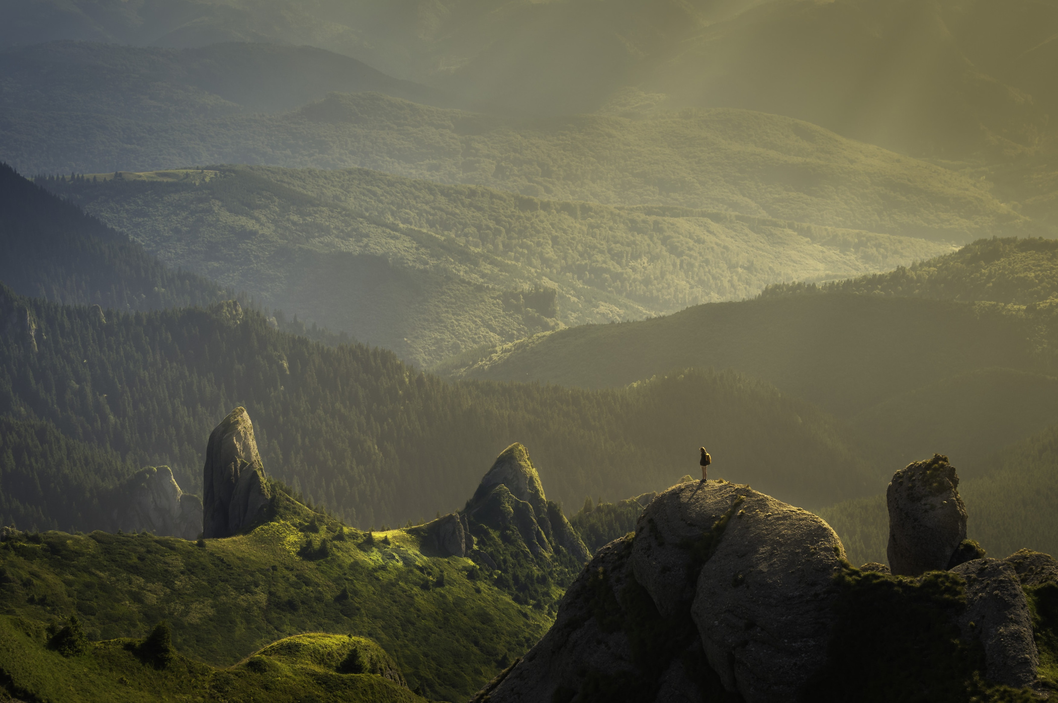 Hiker on Top of the Mountain